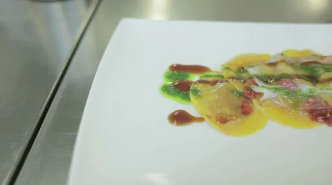 Chef Finalizing Pasta Dish with Vegetable Roll with some Herbs Stock Footage 36051817