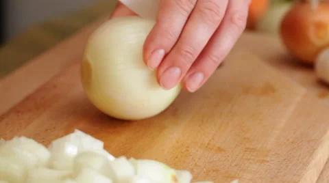 Chef finely chopping onions, closeup Stock Footage 56345925