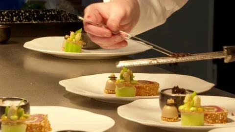 Chef finishing dish with truffle Stock Footage 92081776