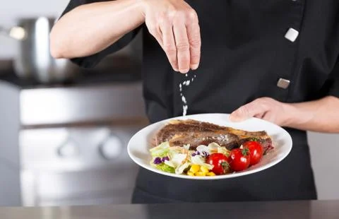Chef finishing your plate Stock Photos