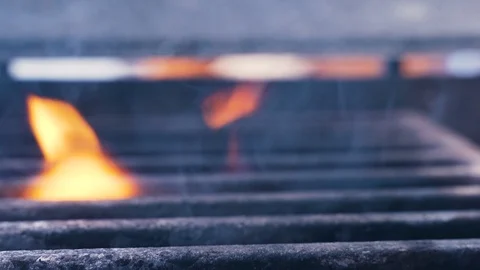 Chef on a fire barbecue grill meat hamburger patty or steak 库存影片 107546035