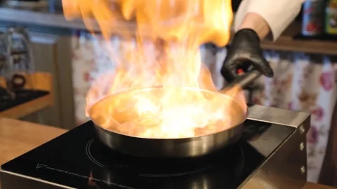 Chef flambe Stock Footage 95108361
