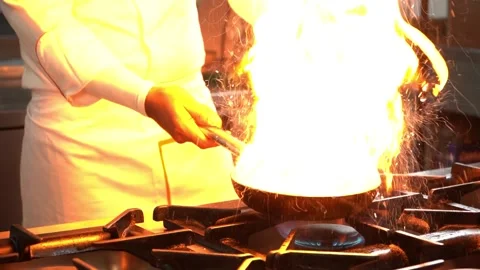 Chef Flambéing in the Kitchen Stock Footage 318310268