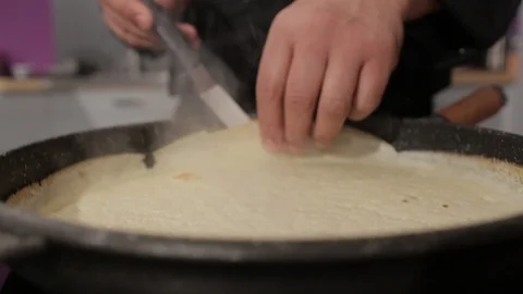 Chef Flipping a crepe Stock Footage 85856373