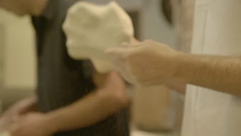 Chef flipping dough in his hand Video stock 87612495