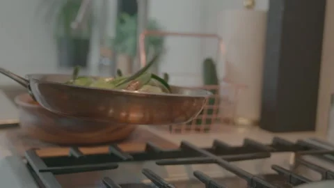 Chef Flipping Vegetables in a Pan Stock Footage 149631011