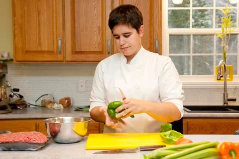 Chef focused on creating meal Stock-Fotos
