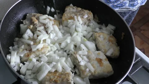 The chef fries fish in a frying pan. healthy food concept Stock Footage 153643530