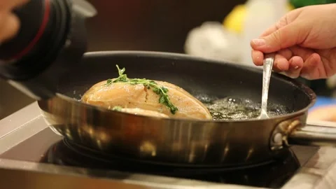 The chef is frying fish 10 Stock Footage 312943866