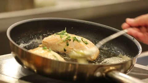 The chef is frying fish 11 Stock Footage 312943891