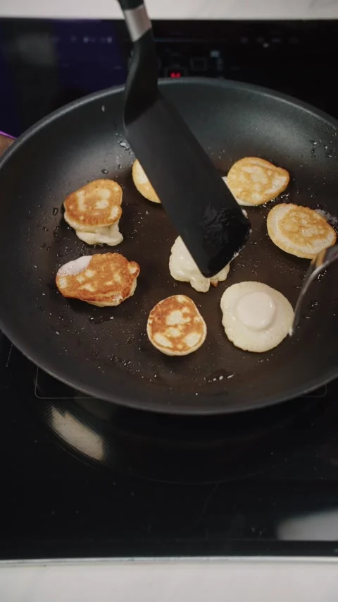 Chef Frying Mini Pancakes in a Pan Video stock 281918831