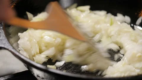 Chef frying onion Video stock 136555287