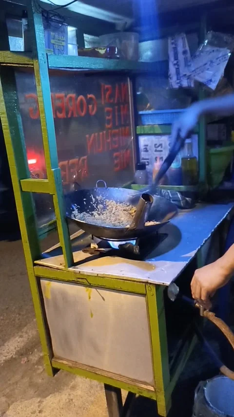 The chef is frying vegetables Stock Footage 287326110