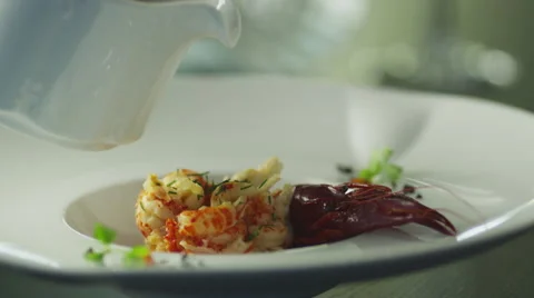 Chef is Garnish Dish with Lobster in Luxury Restaurant Stock Footage