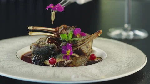 Chef Garnish Fried Beef Ribs in Luxury Restaurant Stock Footage 51216143