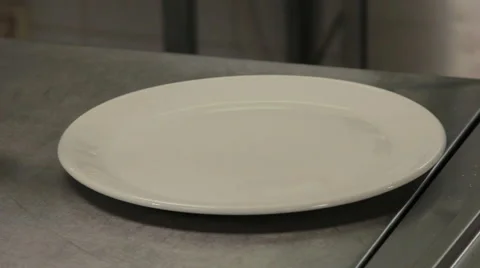 Chef garnishes fried ribs Stock Footage 66041563