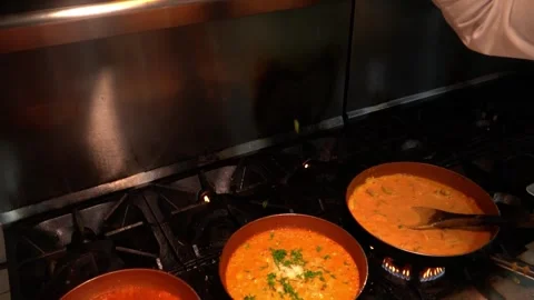Chef Garnishing Curry Dish Stock Footage 319207754