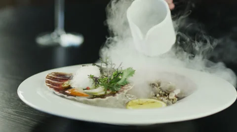 Chef Garnishing Scallops with Dry Ice in Luxury Restaurant. 4K Stock Footage