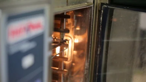 Chef gets pies with oven Stock Footage 70172481