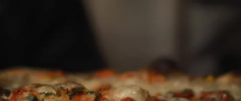 Chef getting ready hot steaming pizza from the oven. Slow motion. Stock Footage 147519165