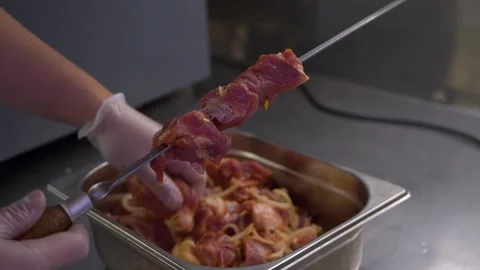 Chef in gloves making kebab, barbecue. Traditional caucasian food. Stock Footage 150833103