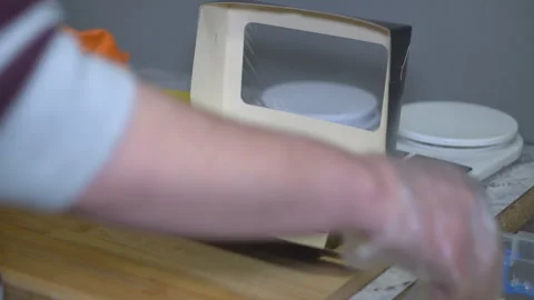 Chef in gloves preparing fish sushi roll Stock Footage 303160770