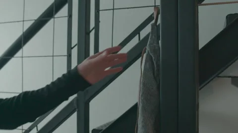 Chef Grabbing Apron From Hook 60FPS Stock Footage 149630920