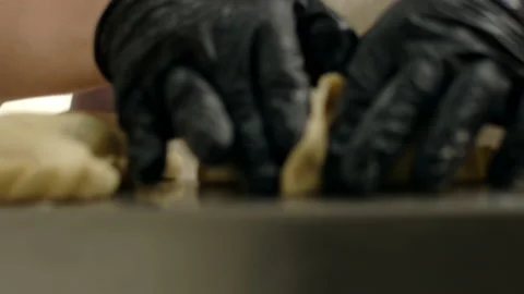 Chef grabbing empanadas Stock Footage 238608681