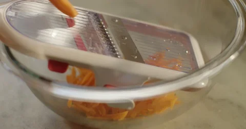 Chef Grates Carrot 스톡 동영상 105370313