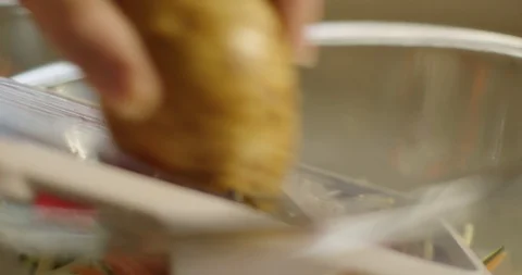 Chef Grates Potato 스톡 동영상 105370429