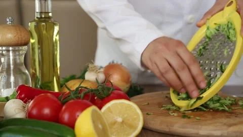 Chef Grating Cucumber With Fresh Ingredients On The Table Видео 343746208