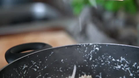 Chef grating parmesan cheese on the pasta slow motion Stock Footage 158983612