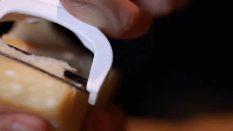 Chef grating Parmesan over spaghetti al pomodoro, Italian dish cooked tradition Stock Footage 76202156