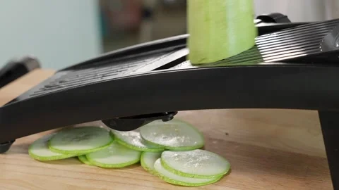 Chef grating zucchini mandalin Stock Footage 265658273