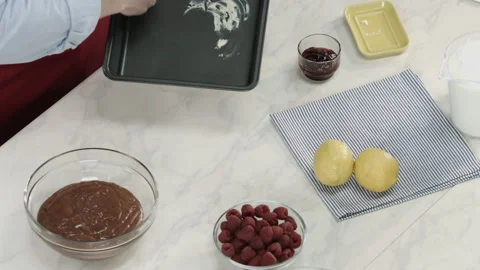 Chef Greasing Baking Plate with Butter Ingredient Stock Footage 164019009