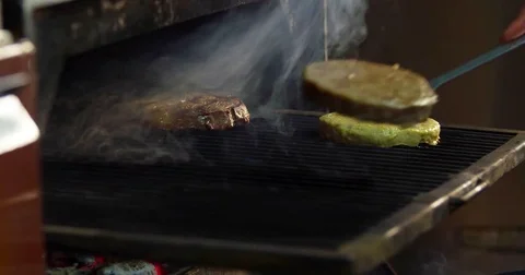 Chef grilling beef patty burger 4k video. Hamburger ground meat barbecue oven Stock Footage 70006700