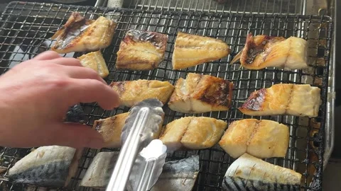 Chef Grilling Salted Mackerel Saba Fillets On Wire Mesh For Bento Japan Stock-Footage 343553677