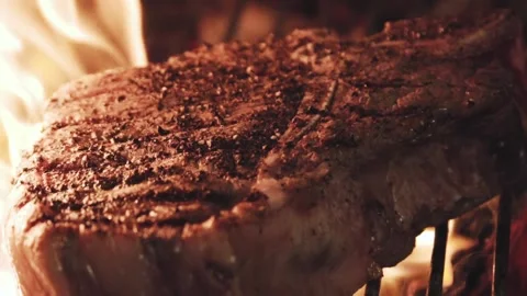 The chef is grilling steak. Stock Footage 130988684