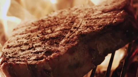 The chef is grilling steak Stock Footage 130988739