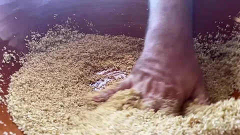 Chef hand close up cous cous preparation in slow motion Stock Footage 277398575