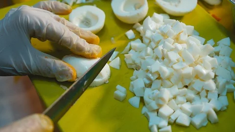 Chef Hand Cuts Hard Boiled Egg Stock Footage 119702720