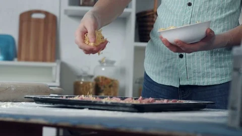 Chef hand sprinkle pizza with cheese Stock Footage 72551160