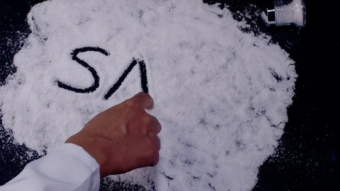 Chef Hand Writes on Salt Video stock 128842121