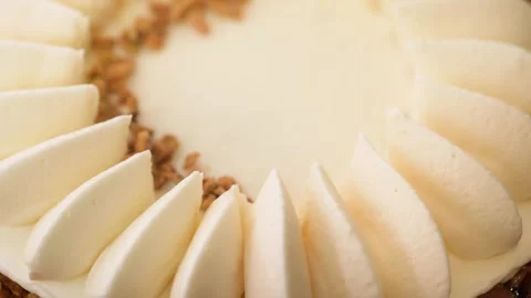 Chef Hands in Black Gloves Plating Gourmet Banana Cream Pie with Petal-Shaped Cr Stock Footage 337751504