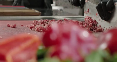 Chef hands chop meat with a big knife. Preparation of minced meat for cutlets Stock Footage 259340705