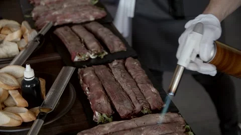 Chef hands cooking meat and burns him. Stock Footage 166706281