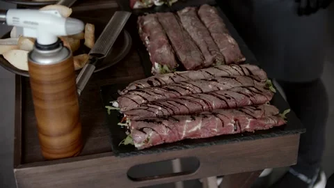 Chef hands cooking meat and adding sauce. Stock Footage 166706284