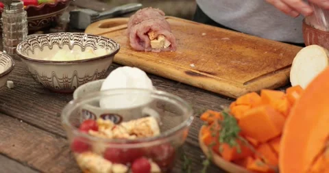 Chef hands cooking turkey roll stuffed with cheese for Thanksgiving dinner Stock Footage 165121478