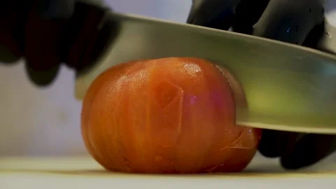 Chef Hands Cut Tomato On A Board Stock Footage 145194011