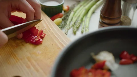 Chef Hands Cutting Red Chili Pepper on Wooden Board Stock Footage 249831339